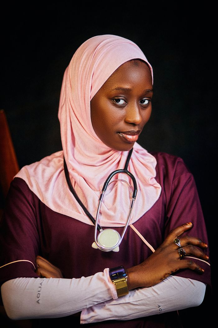 Portrait of a young female doctor in a hijab with a stethoscope, exuding confidence and professionalism.